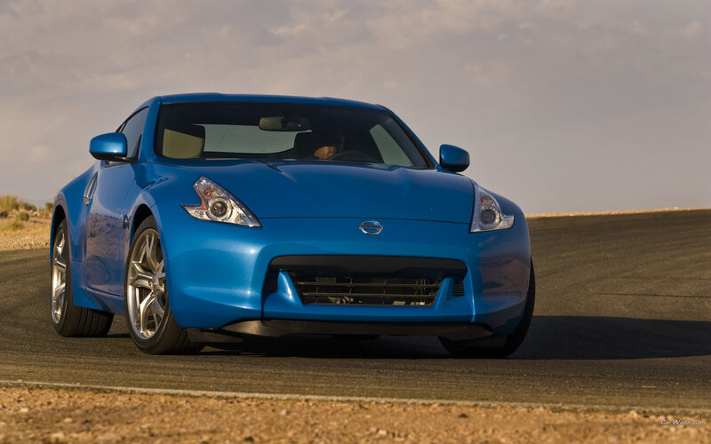 Blue Nissan 370Z on a road