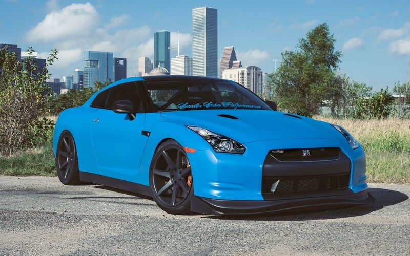 Blue Nissan GT-R in city