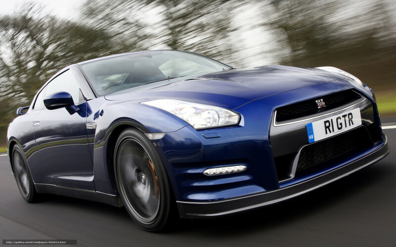 Blue Nissan GT-R in motion