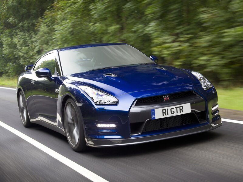 Blue Nissan GT-R in motion