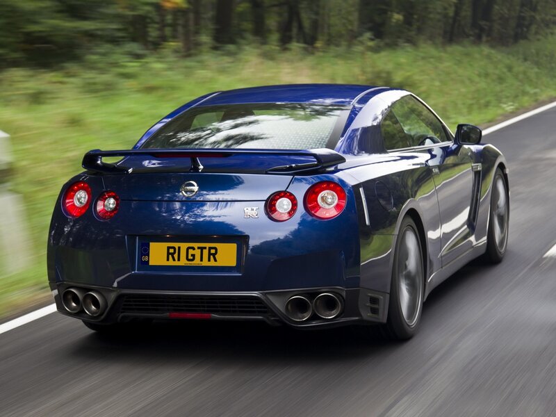 Blue Nissan GT-R in motion