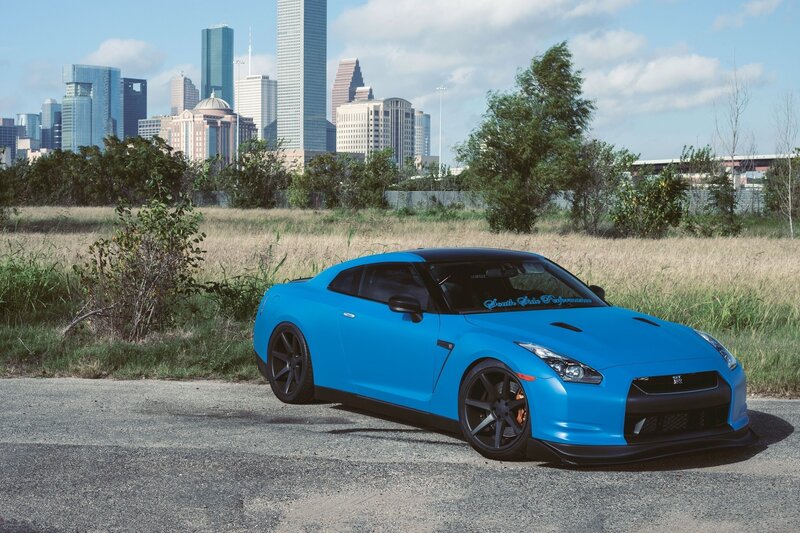 Blue Nissan GT-R in urban setting