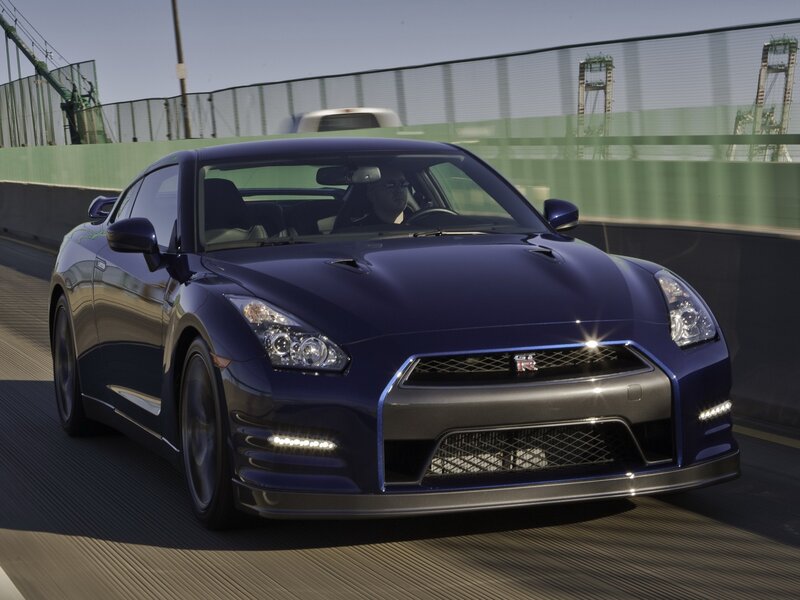 blue nissan gt-r on a bridge