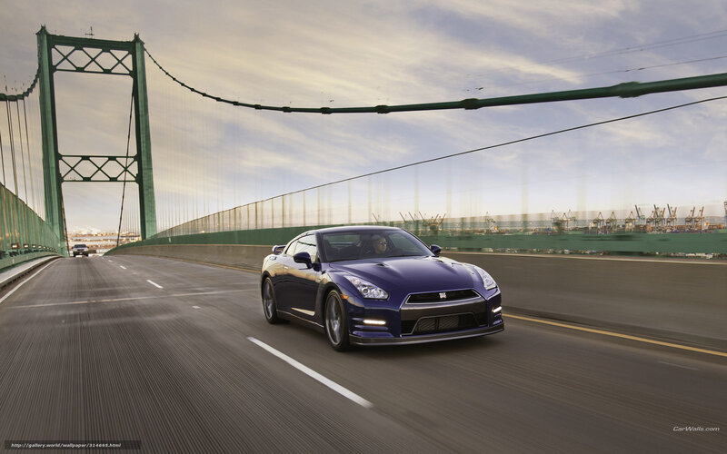 Blue Nissan GT-R on a bridge