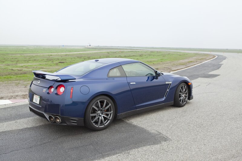 Blue Nissan GT-R on a racetrack