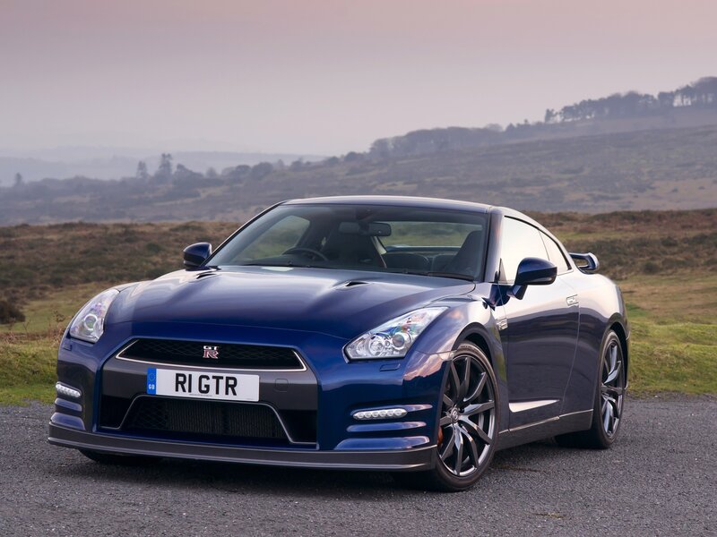 Blue Nissan GT-R on a road