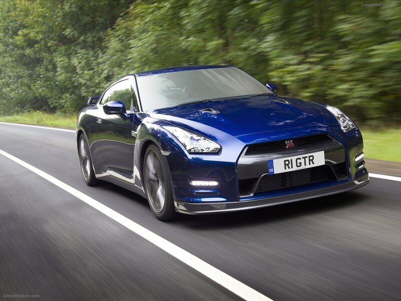 Blue Nissan GT-R on a road