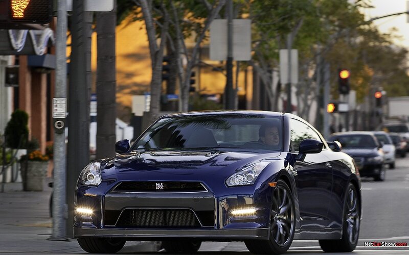 Blue Nissan GT-R on city street
