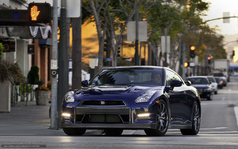 Blue Nissan GT-R on city street