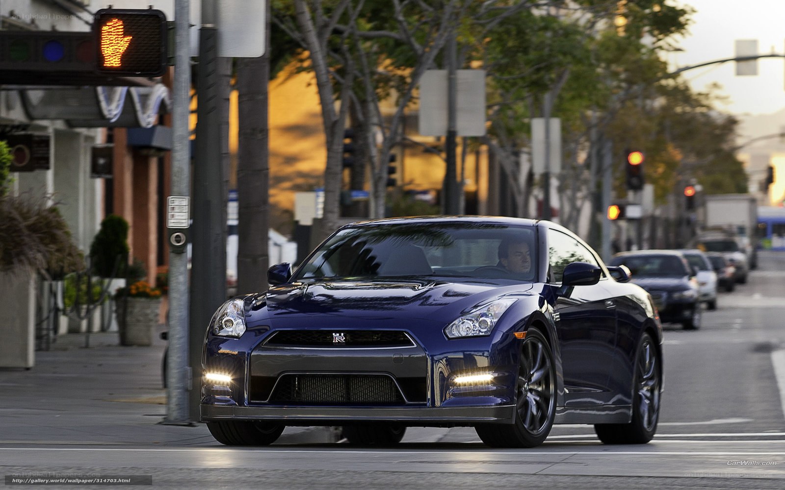 Blue Nissan GT-R on city street