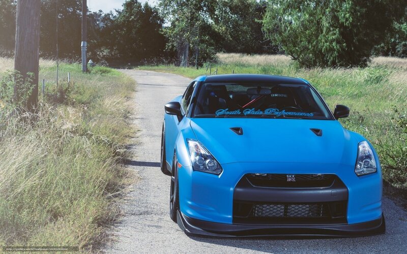 blue nissan gt-r on country road