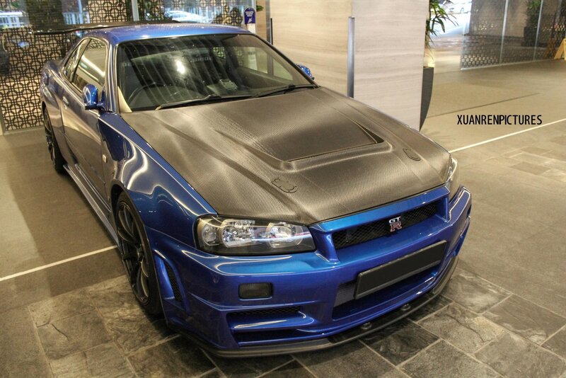 Blue Nissan GT-R with carbon fiber hood