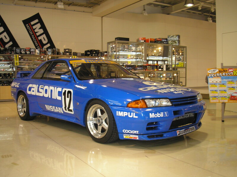 Blue Nissan race car on display