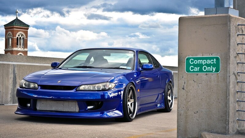 Blue Nissan S15 on a bridge
