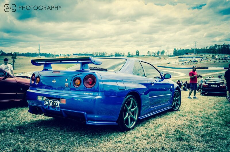 Blue Nissan Skyline at a car show