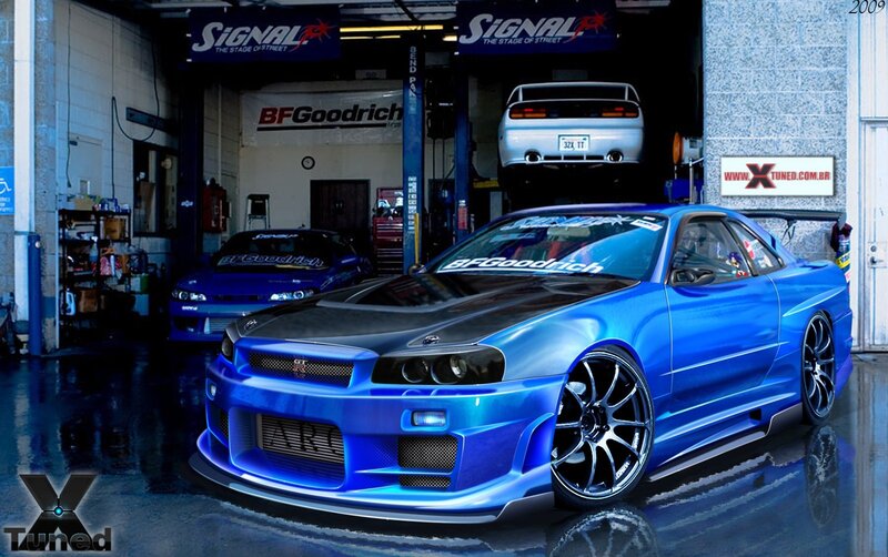 blue nissan skyline in garage