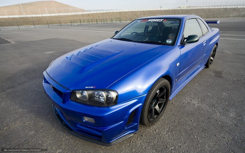 blue nissan skyline on racetrack