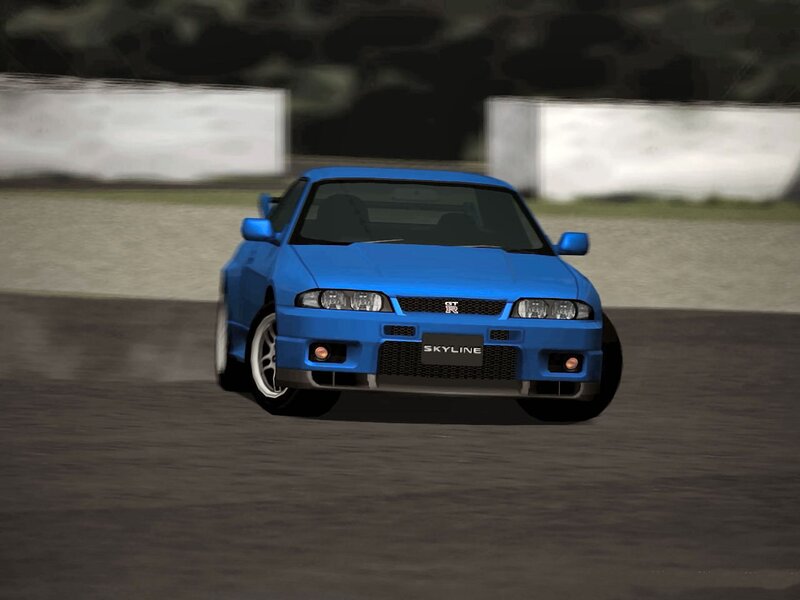 blue nissan skyline on track