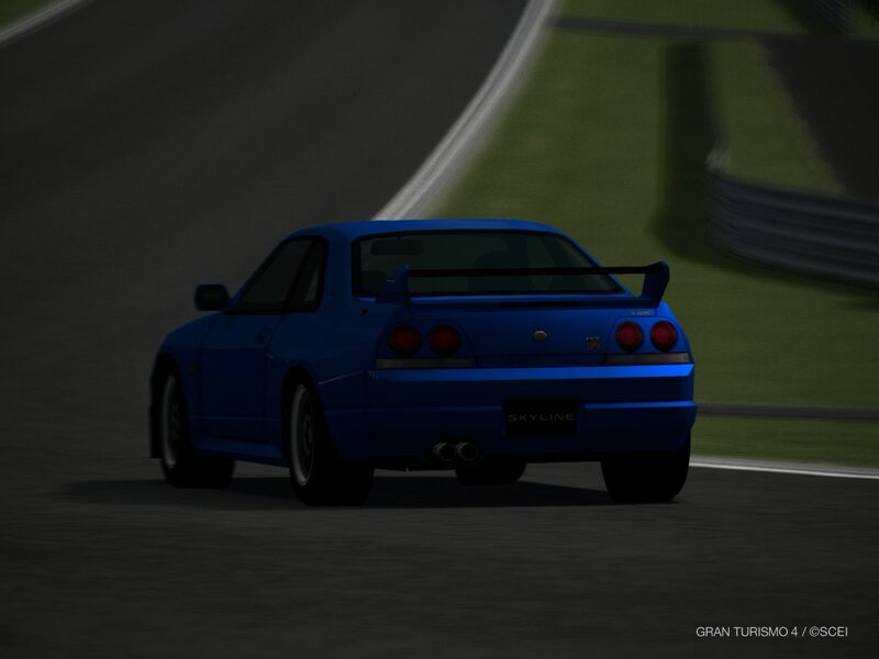 blue nissan skyline on track