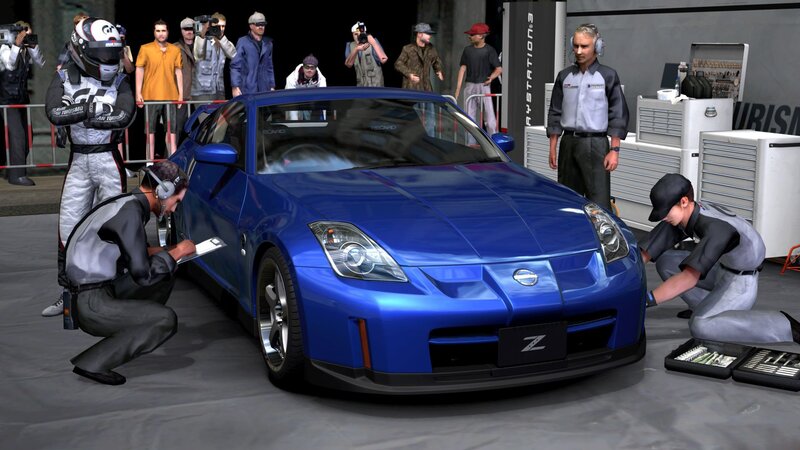 Blue Nissan Z car at pit stop
