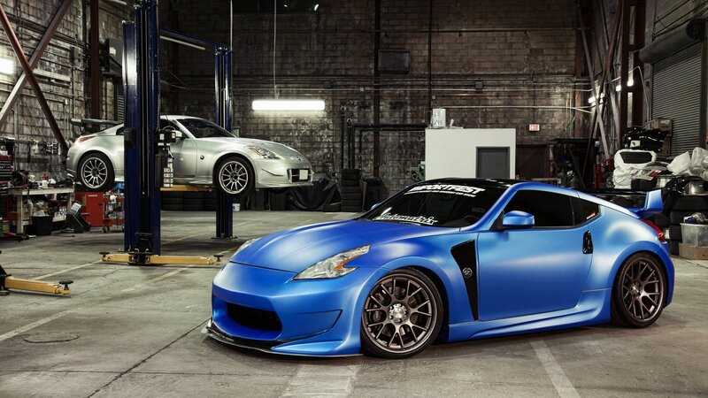 Blue Nissan Z in a garage