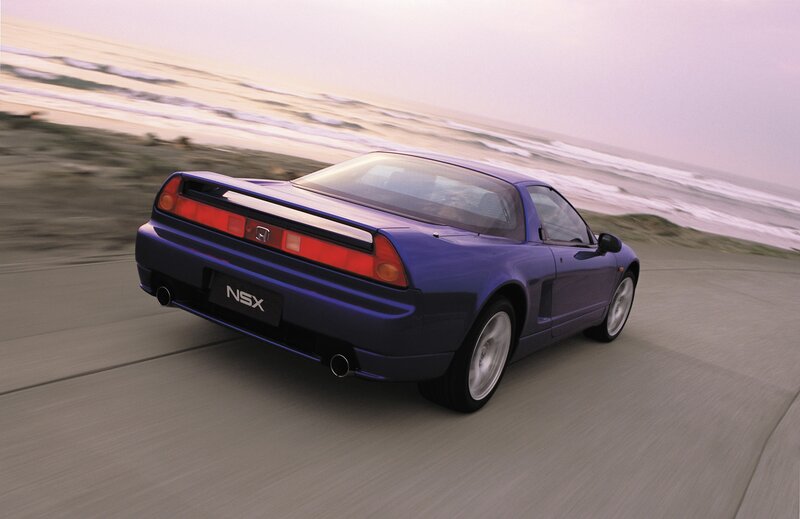 Blue NSX driving on beach road