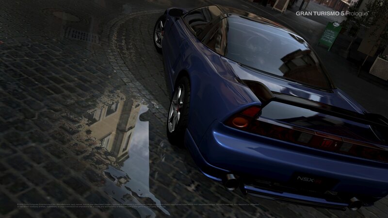 Blue NSX-R on wet cobblestones