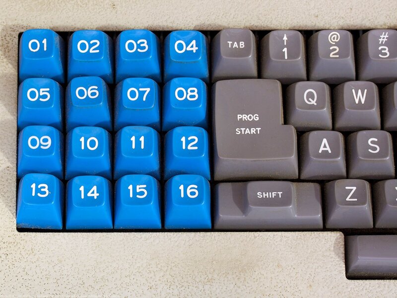 blue numeric keypad on vintage keyboard