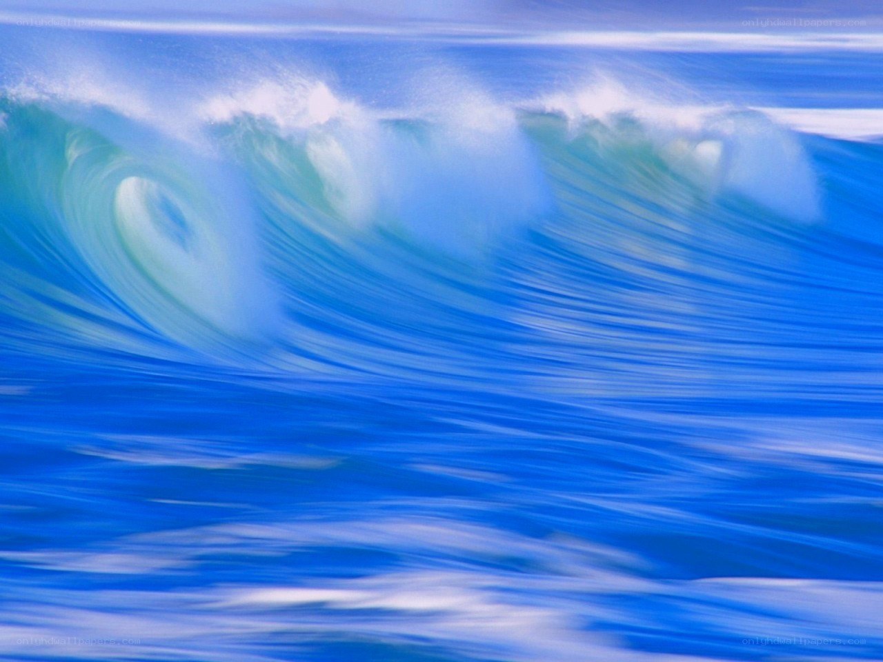 Blue ocean wave in motion