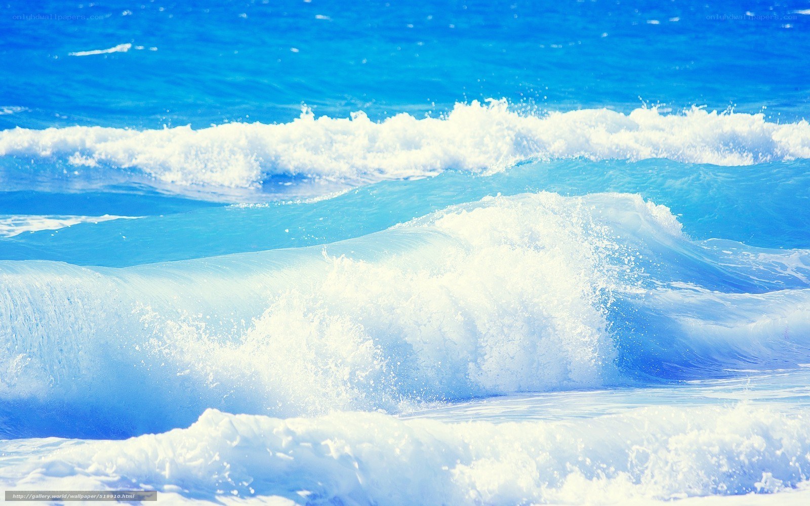 Blue ocean waves crashing