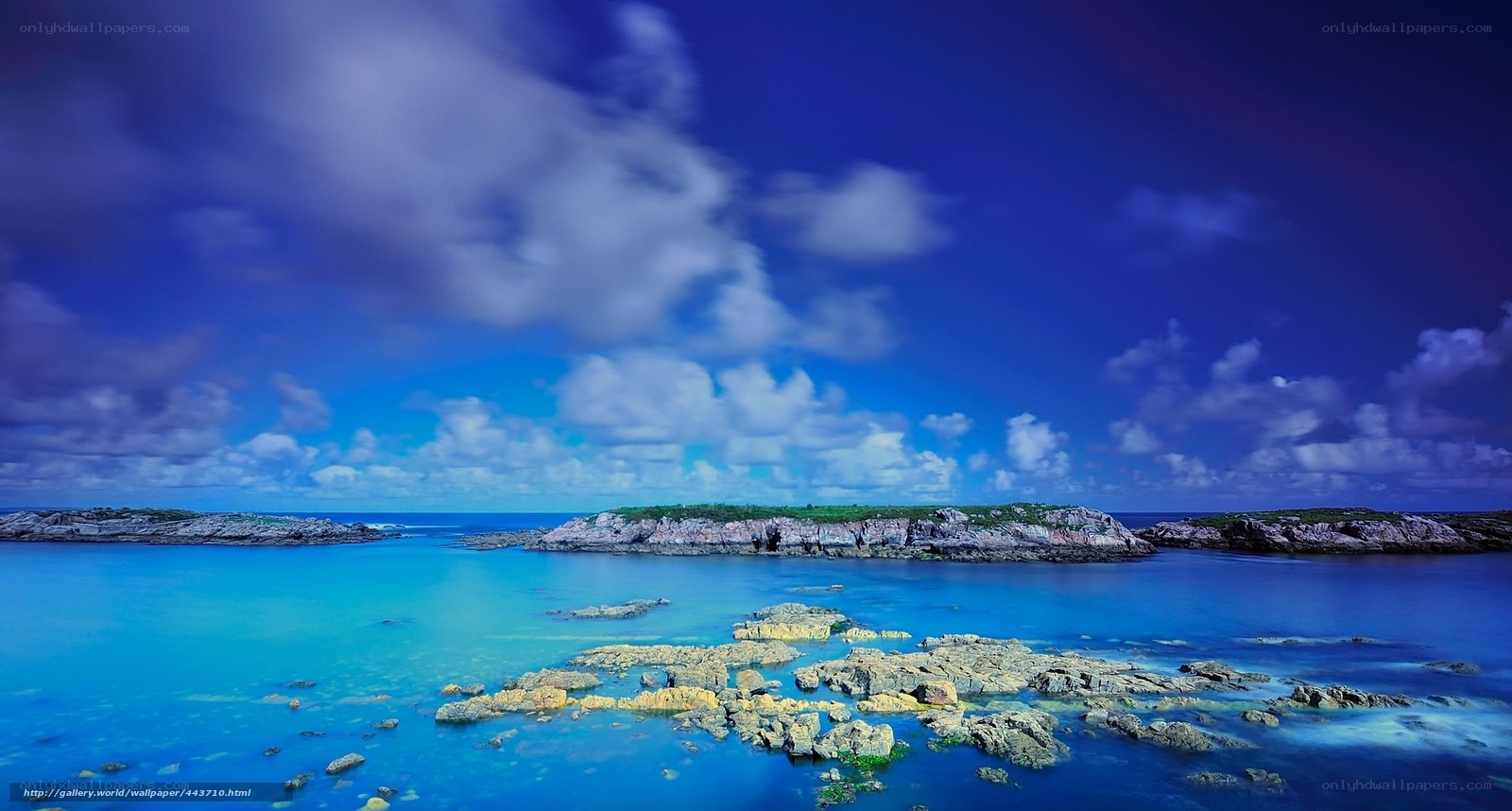 Blue ocean with rocky islands