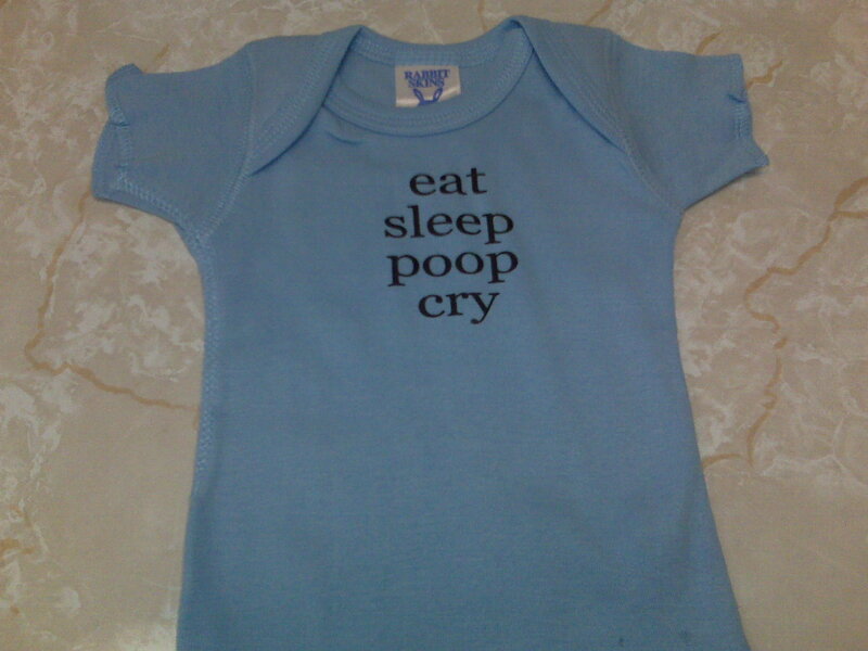 blue onesie with text