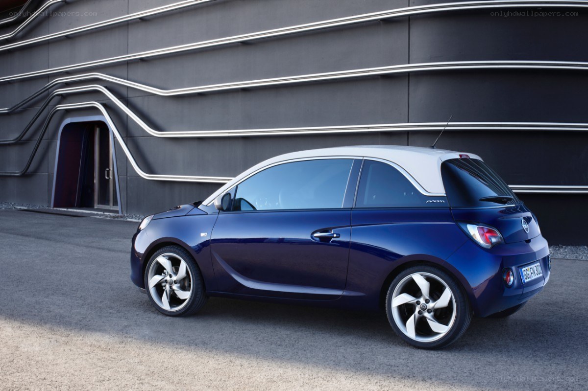 Blue Opel Adam parked outside