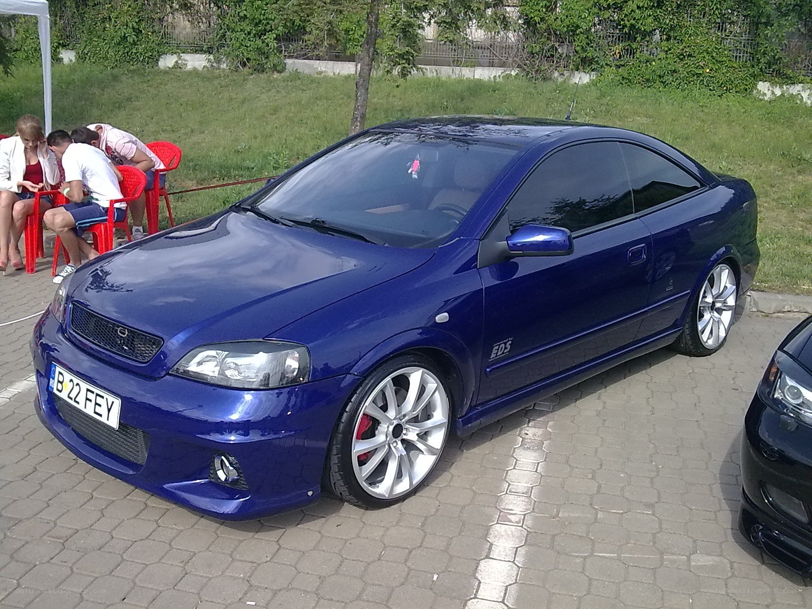 Blue Opel Astra Coupe