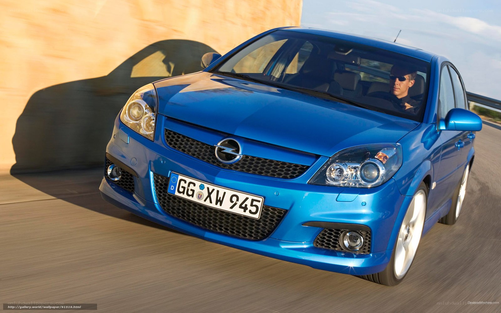 blue opel astra in motion