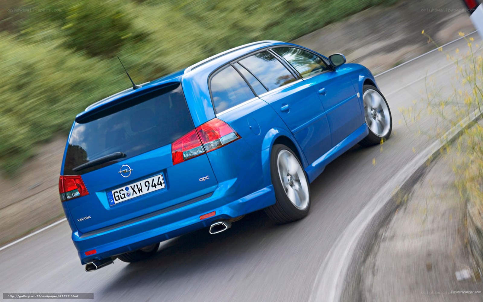 blue opel vectra in motion