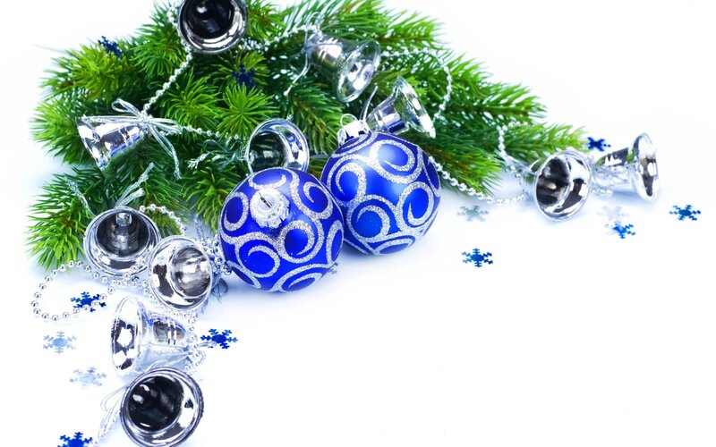 blue ornaments on pine branch