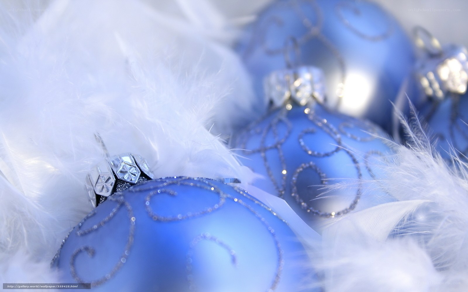 blue ornaments with white feathers