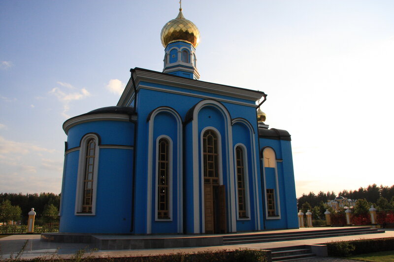 Blue Orthodox church with golden dome