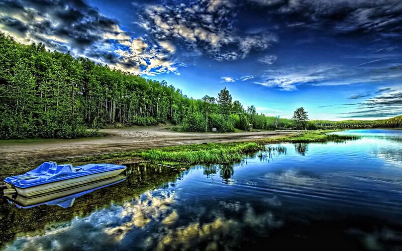 Blue paddle boat on a lake