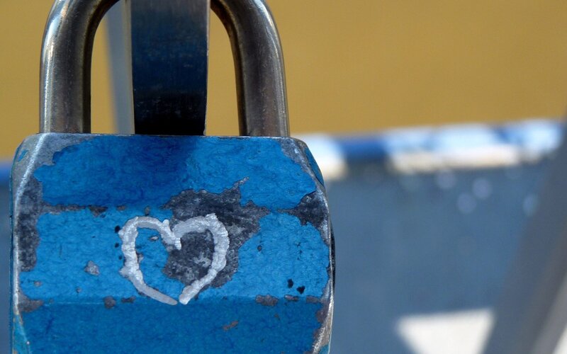 Blue padlock with heart drawing