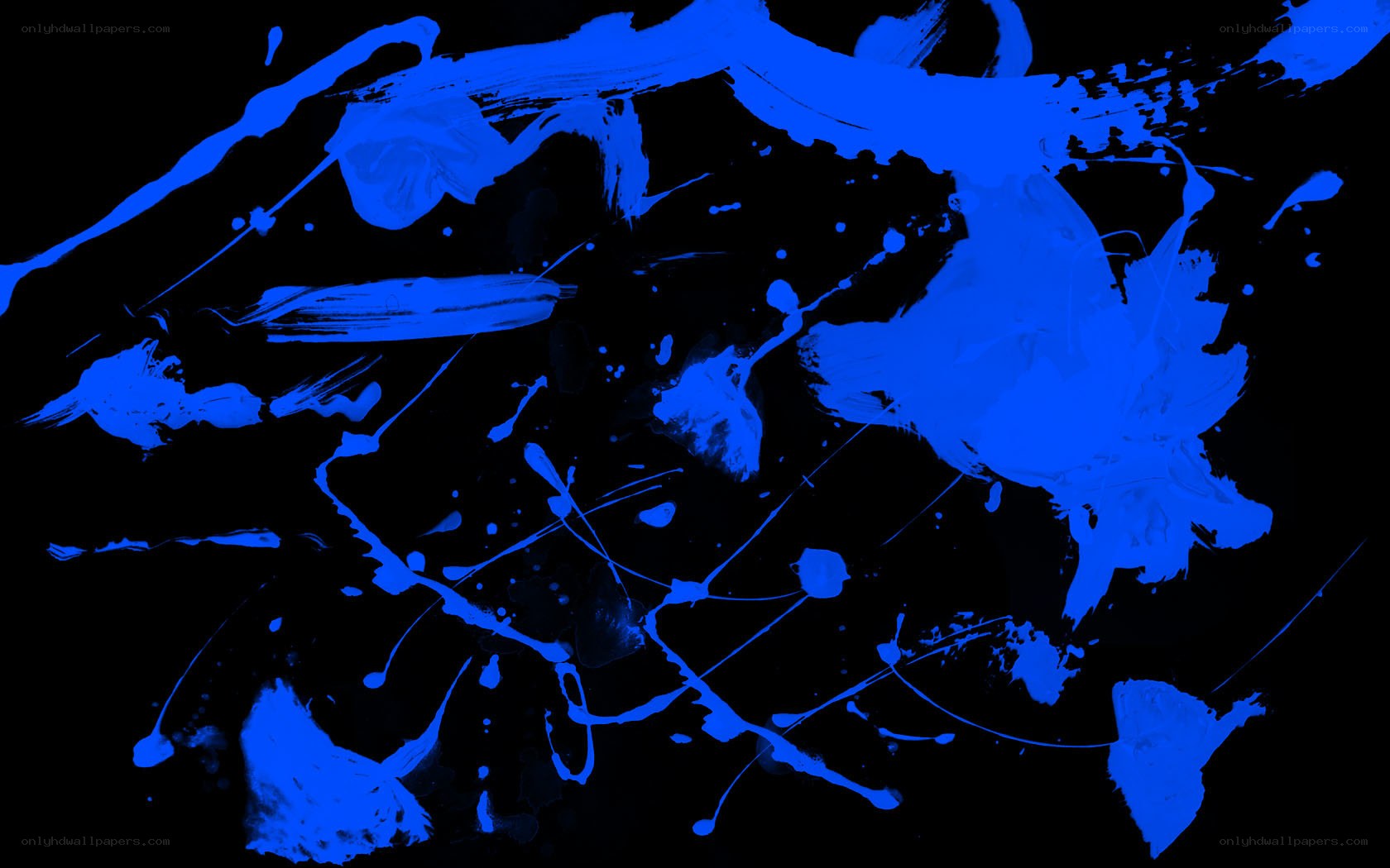 blue paint splatters on black
