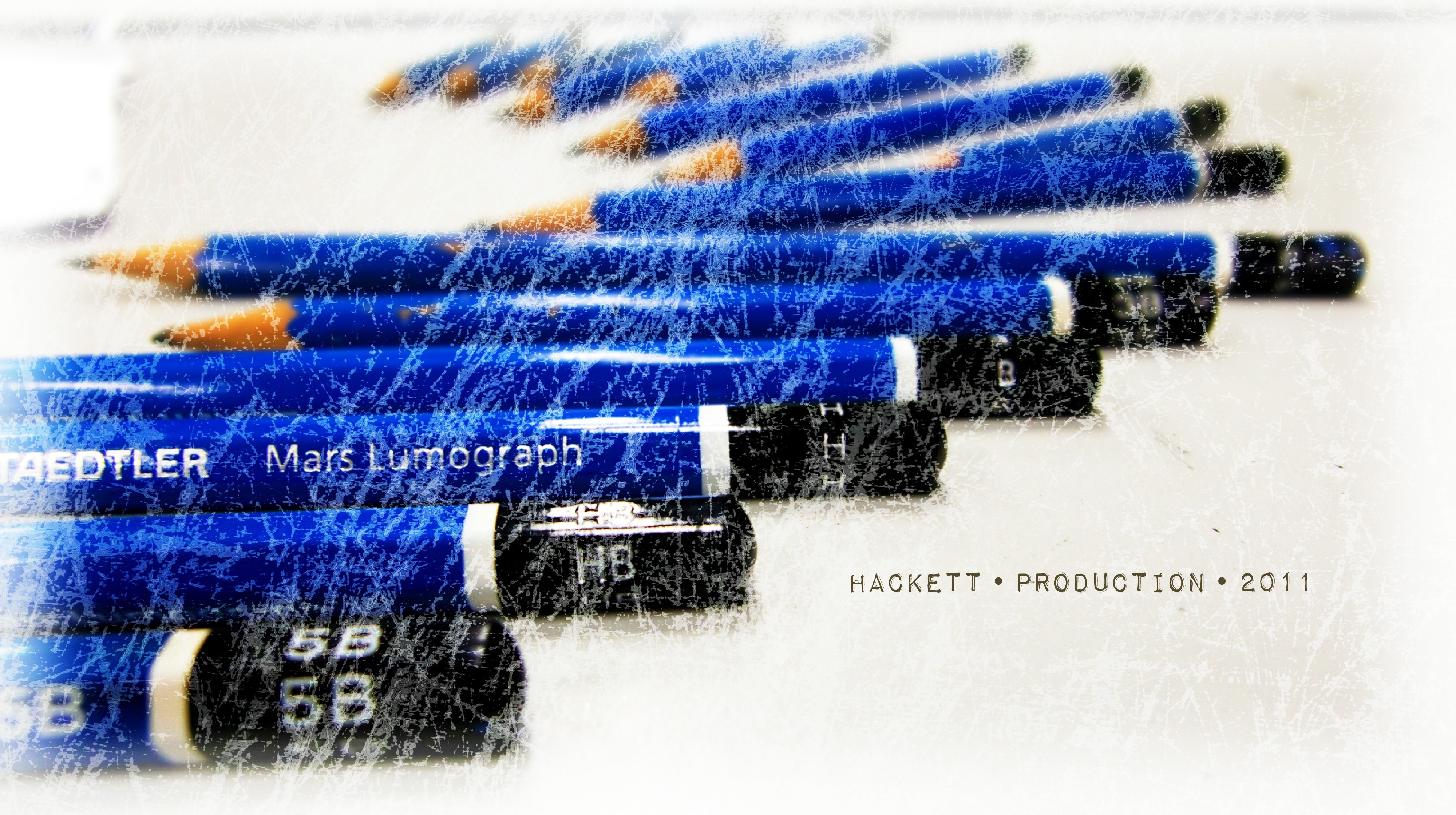 Blue pencils in a row