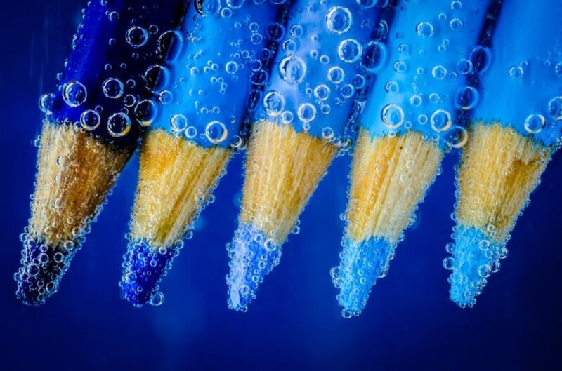Blue Pencils Underwater