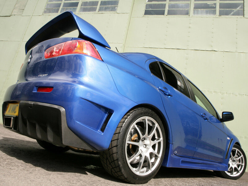 Blue Performance Car — Dramatic, Afternoon