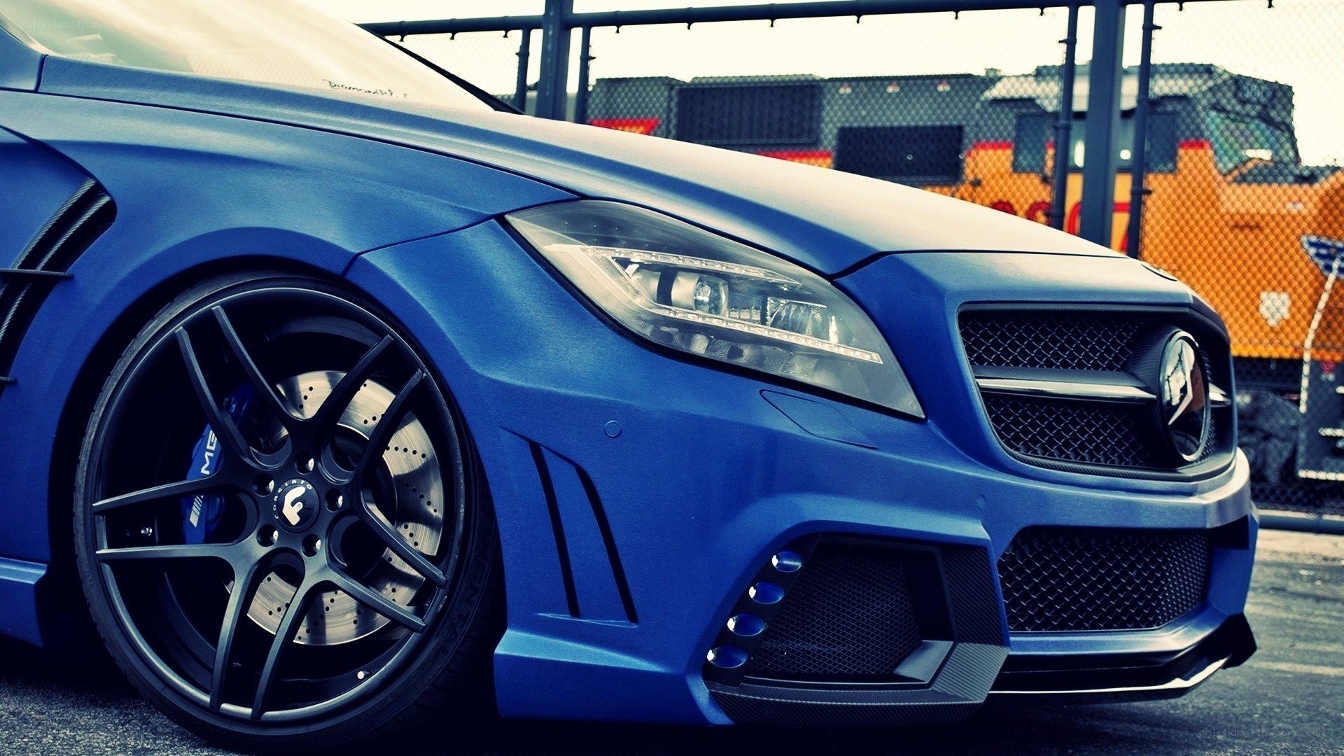 blue performance car front view
