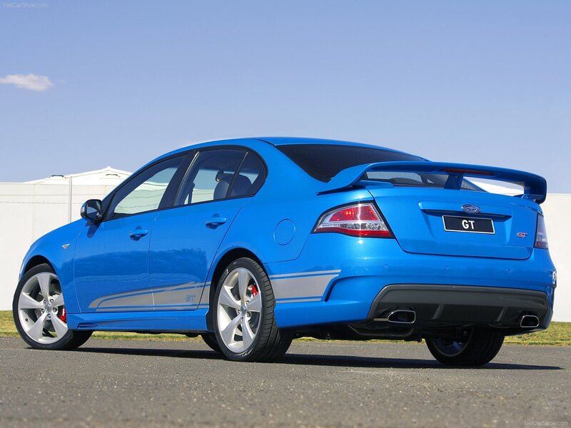 Blue Performance Sedan — Clear, Afternoon