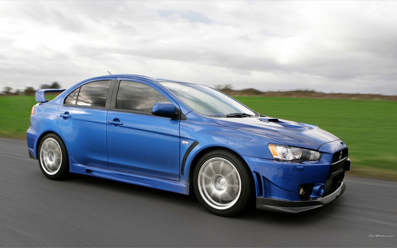 Blue Performance Sedan — Dynamic, Afternoon, Photograph
