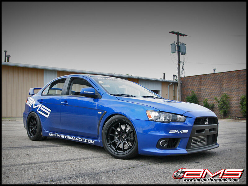 Blue Performance Sedan — Neutral, Afternoon, Photograph
