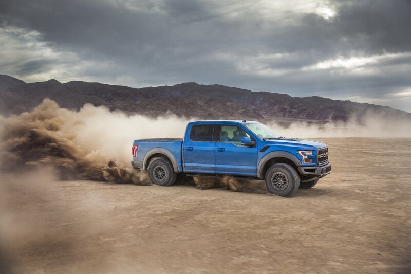 Blue Pickup Truck — Dramatic, Photograph, Dust Cloud